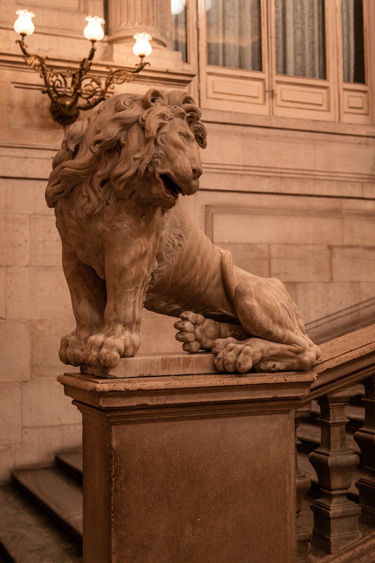 Brown Concrete Statue Of Lion 