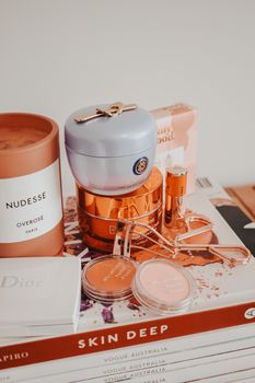 A chic arrangement of luxury cosmetics in Melbourne, Australia, featuring skincare essentials and beauty tools.