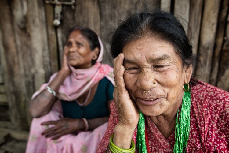 A Woman With Nose Ring Touching Her Cheek