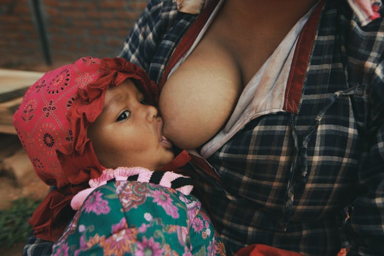 Woman Breastfeeding A Baby