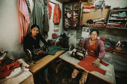 Women Sewing Garments in a Shop