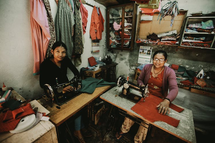 Women Sewing Garments In A Shop