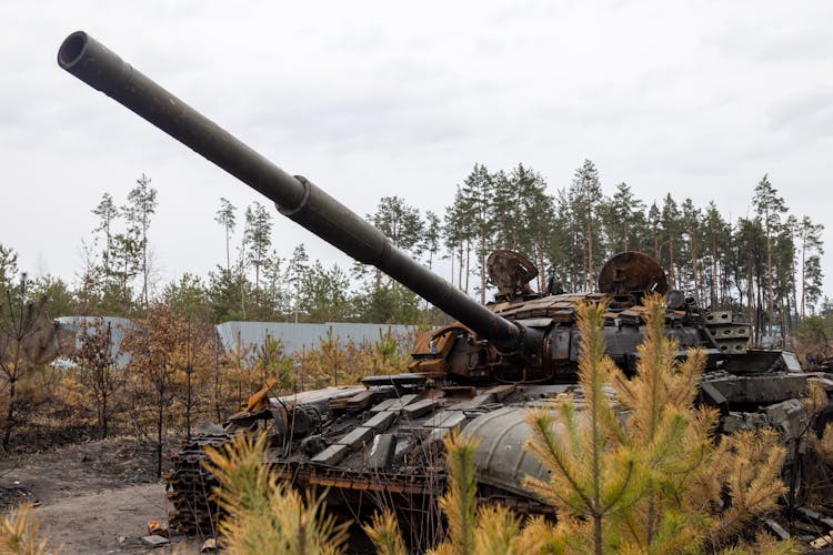 
A Military Tank Under A Cloudy Sky