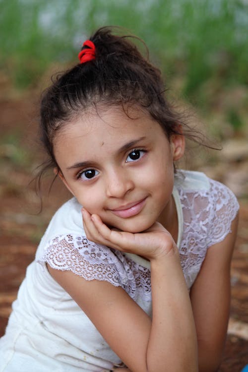 Free Girl in White Lace Shirt Stock Photo