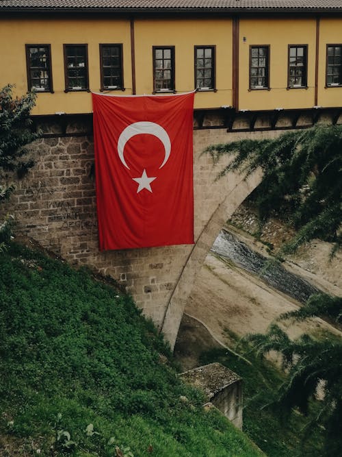 Free Flag of Turkey Hanging from the Windows Stock Photo