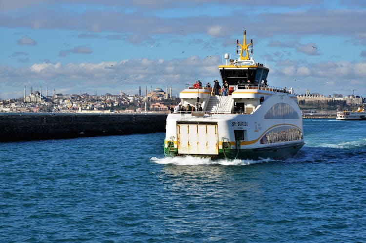 Ferry Boat Cruising On River 