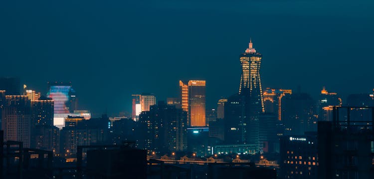 Downtown City Buildings In Lights At Night 