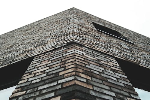 Low Angle Photo of Brown Concrete Building