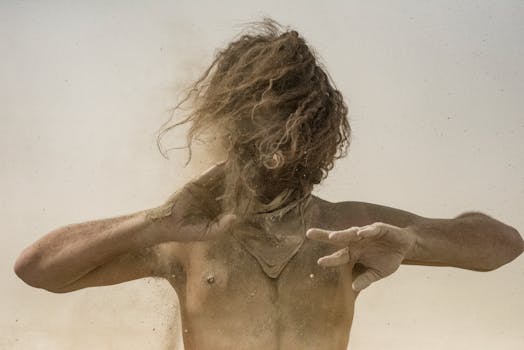 Topless Woman Standing on Sand