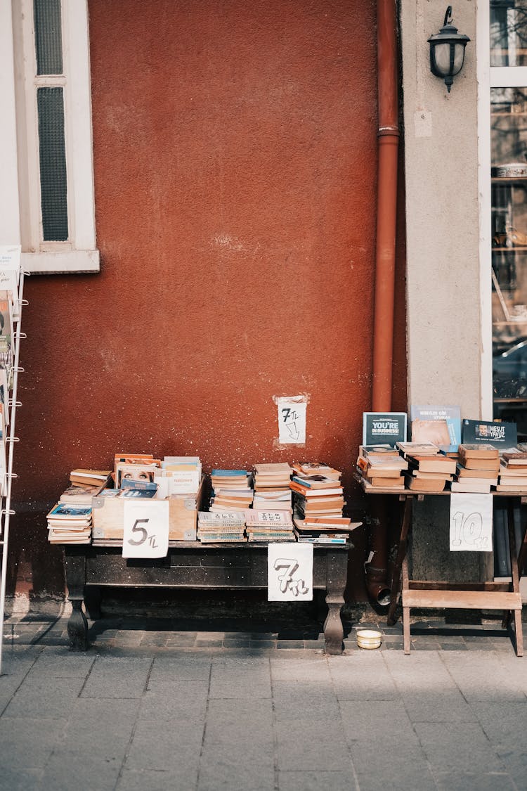 Piles Of Books On Wooden Tables