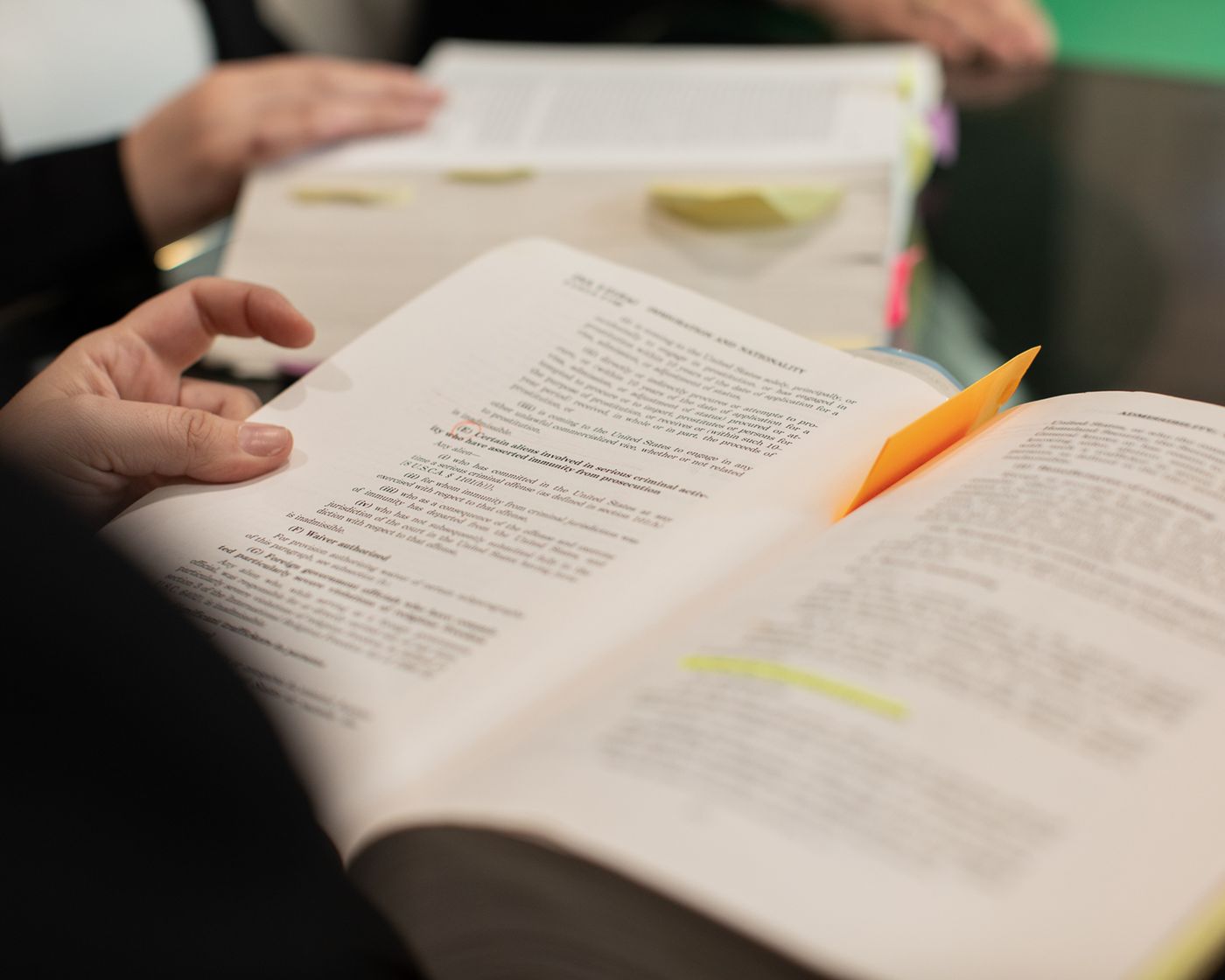 An open book with notes in the margin
