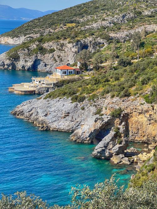 Free Scenic aerial view of Kuşadası coastline with blue sea and rocky landscape. Stock Photo