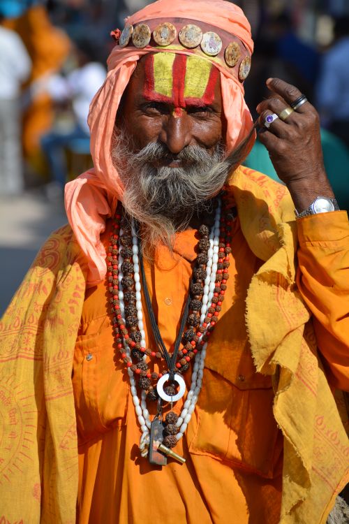 Free Vibrant image of a bearded Indian man in traditional attire, Pushkar. Stock Photo