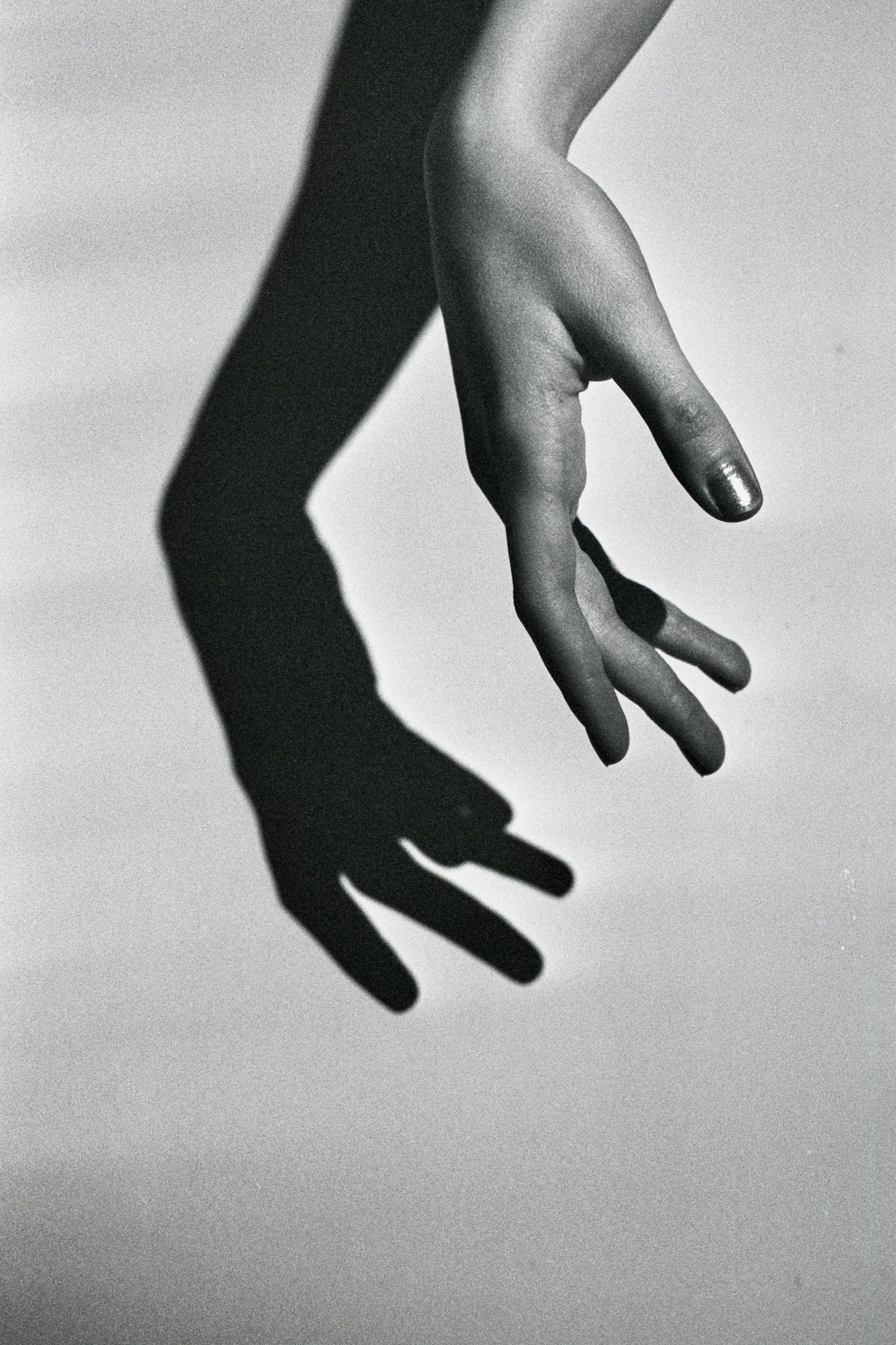 Grayscale Photo of a Hand · Free Stock Photo