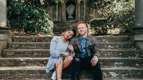 Smiling Couple on Stairs