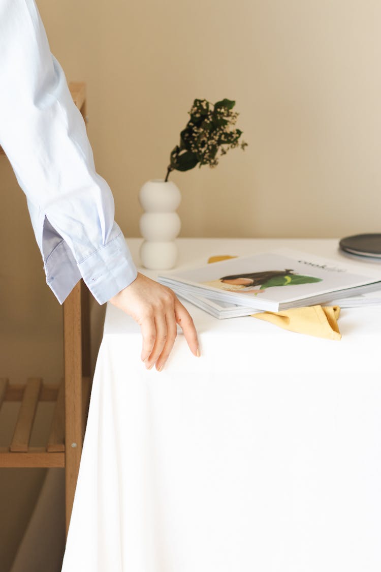 Woman Hand Touching Table