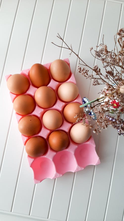 Brown Eggs on Pink Tray