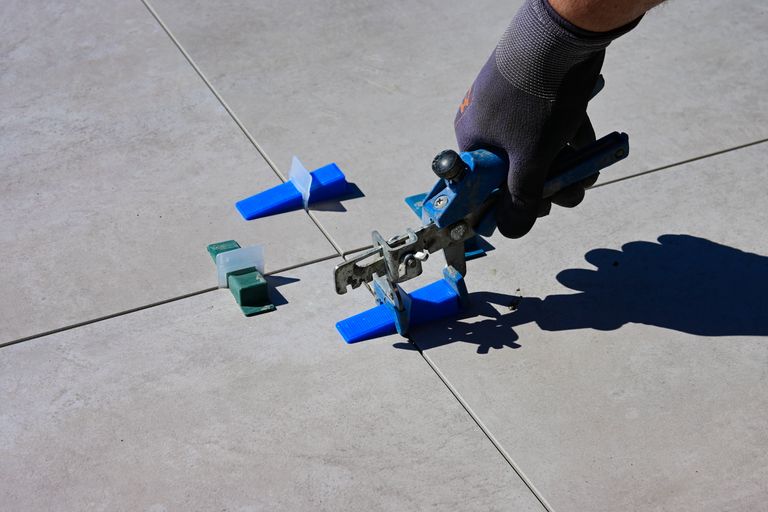 Precision tile leveling system used during premium tile installation