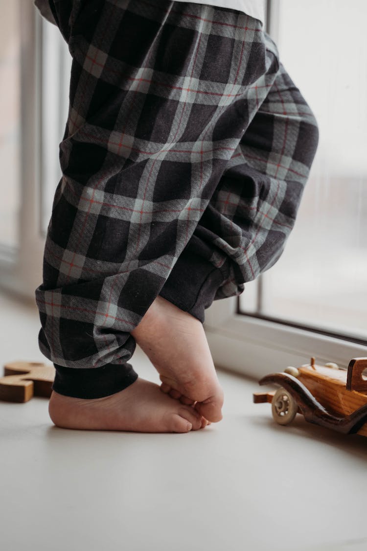 Baby Feet By Window