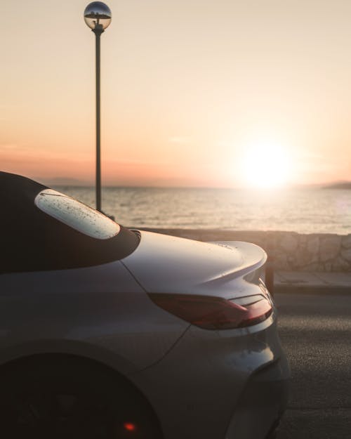 Ingyenes stockfotó arany naplemente, autó, BMW Z4 témában