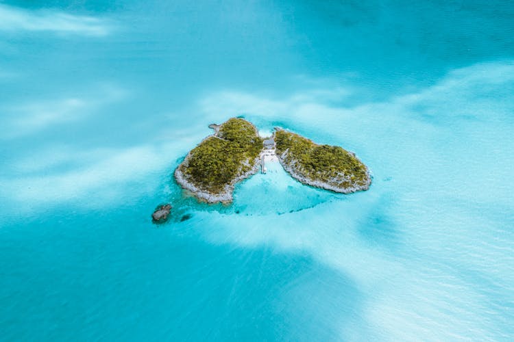 Paradise Island Surrounded By Turquoise Water