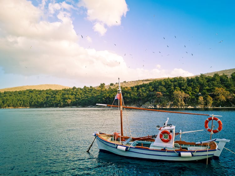 Sailboat Anchored On Sea