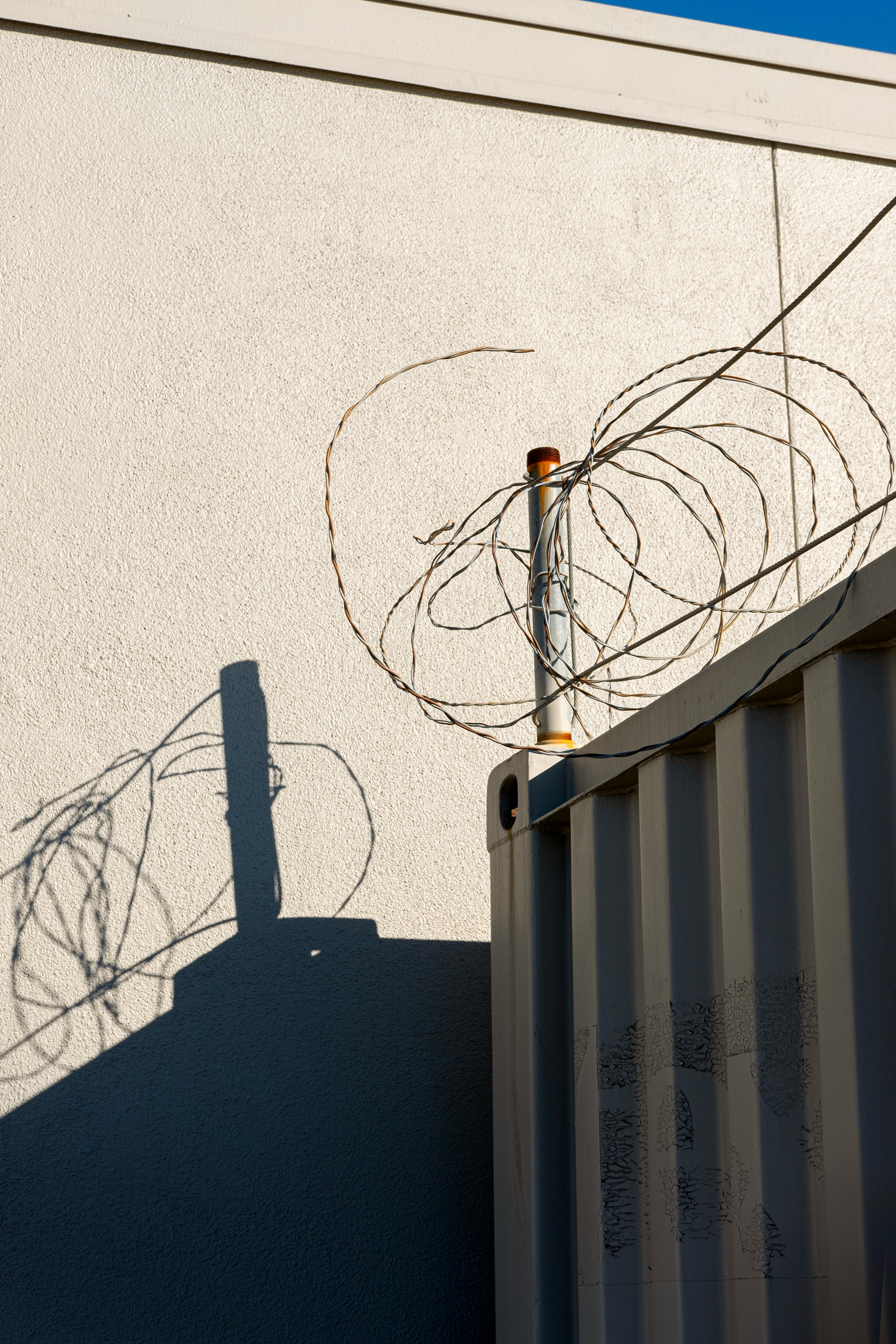 Barbed Wire on Building · Free Stock Photo