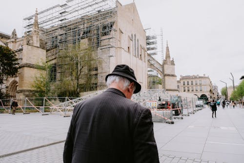 Elderly Man in Suit Jacket Walking on the Street