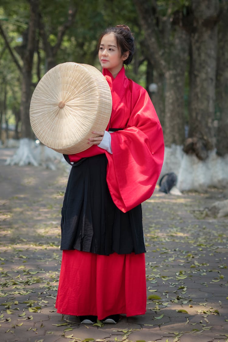 Asian Woman In Traditional Clothes 