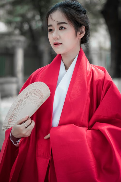 Close-Up Shot of a Beautiful Woman in Traditional Clothing