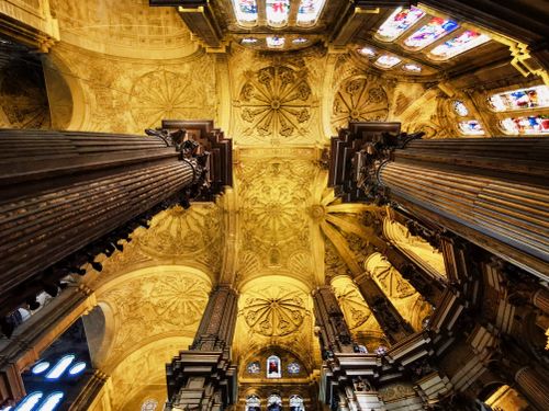 Free Stunning view of the ornate ceiling and pillars inside the Cathedral of Malaga, Spain. Stock Photo