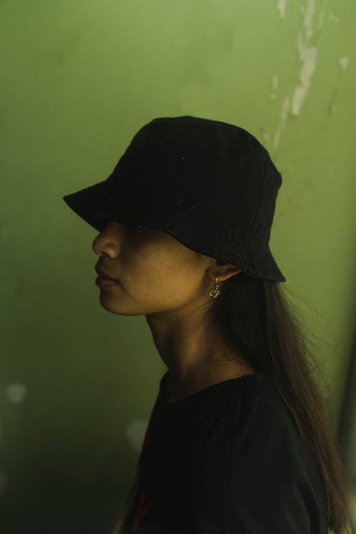 Free Woman in Black Shirt Wearing Black Hat Stock Photo