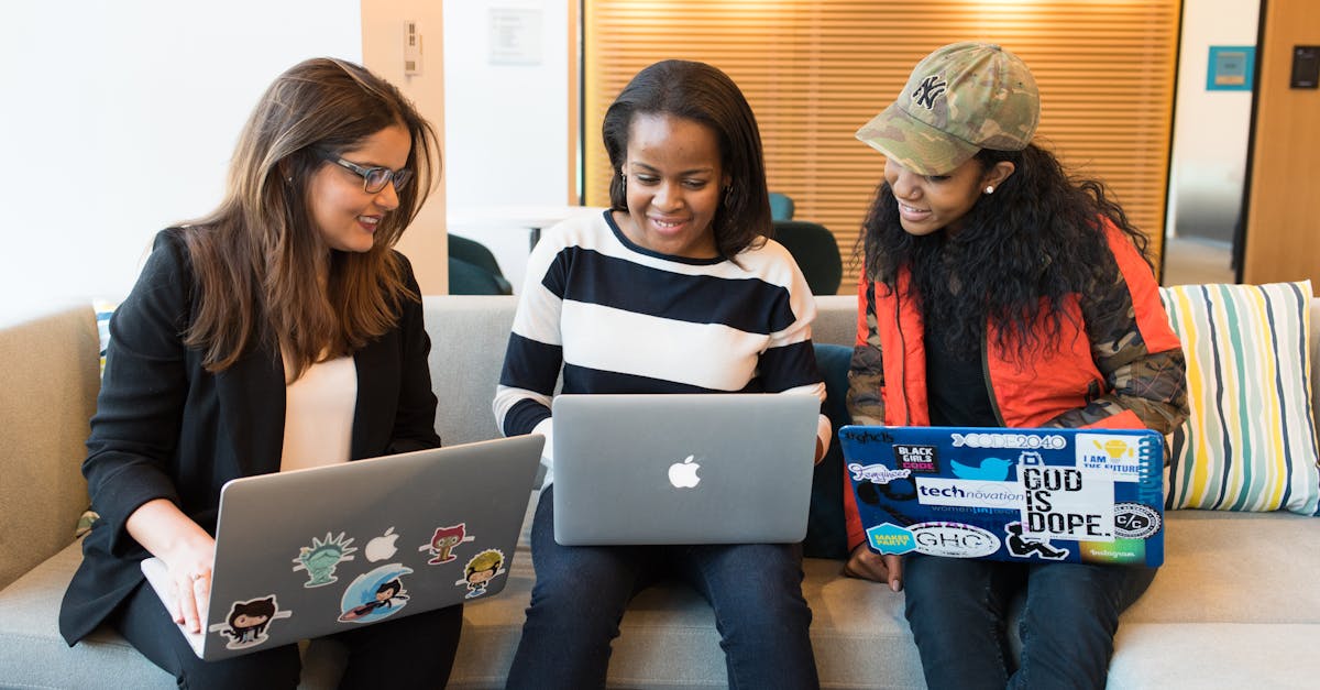 Three Woman in Front of Laptop Computer