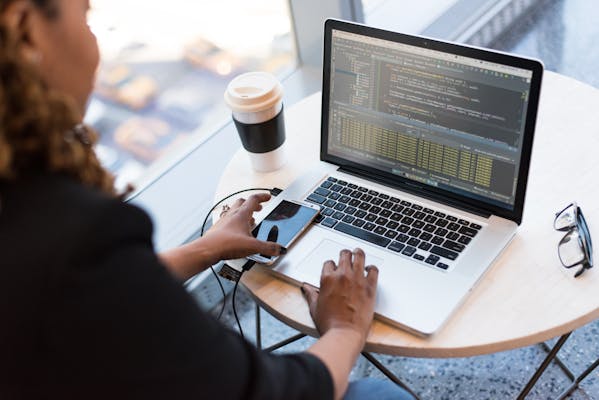 AI Prompt Engineer at work with advanced AI tools and interfaces