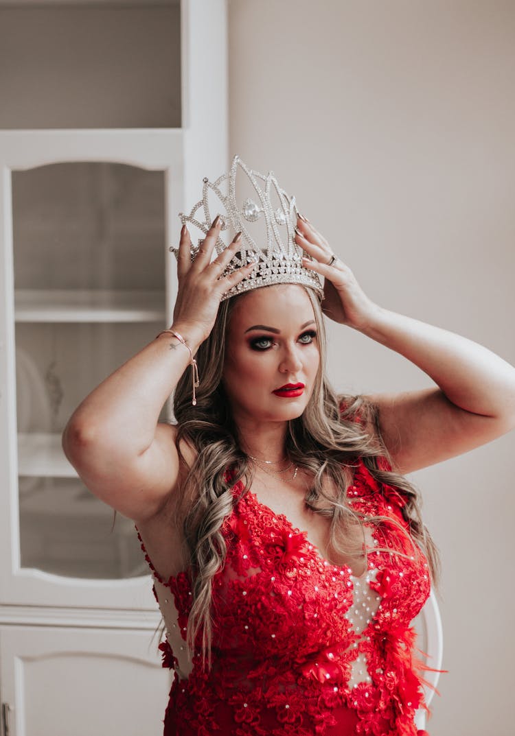 Woman In Red Dress And Crown