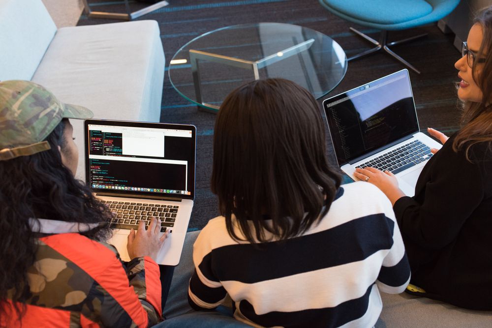 Hackathon team collaborating, Christina Morillo on Pexels