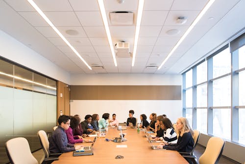 Free Group of People in Conference Room Stock Photo