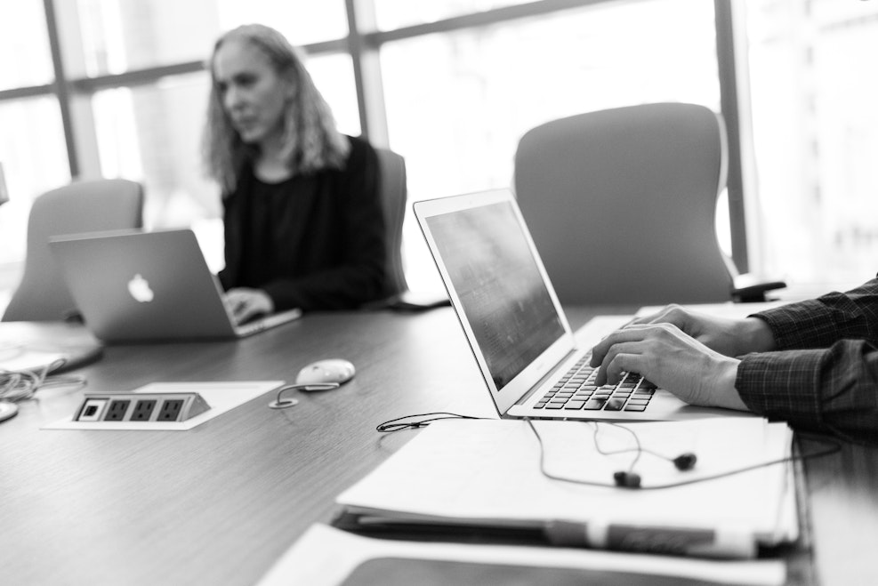 Consulting team analyzing network cost efficiency