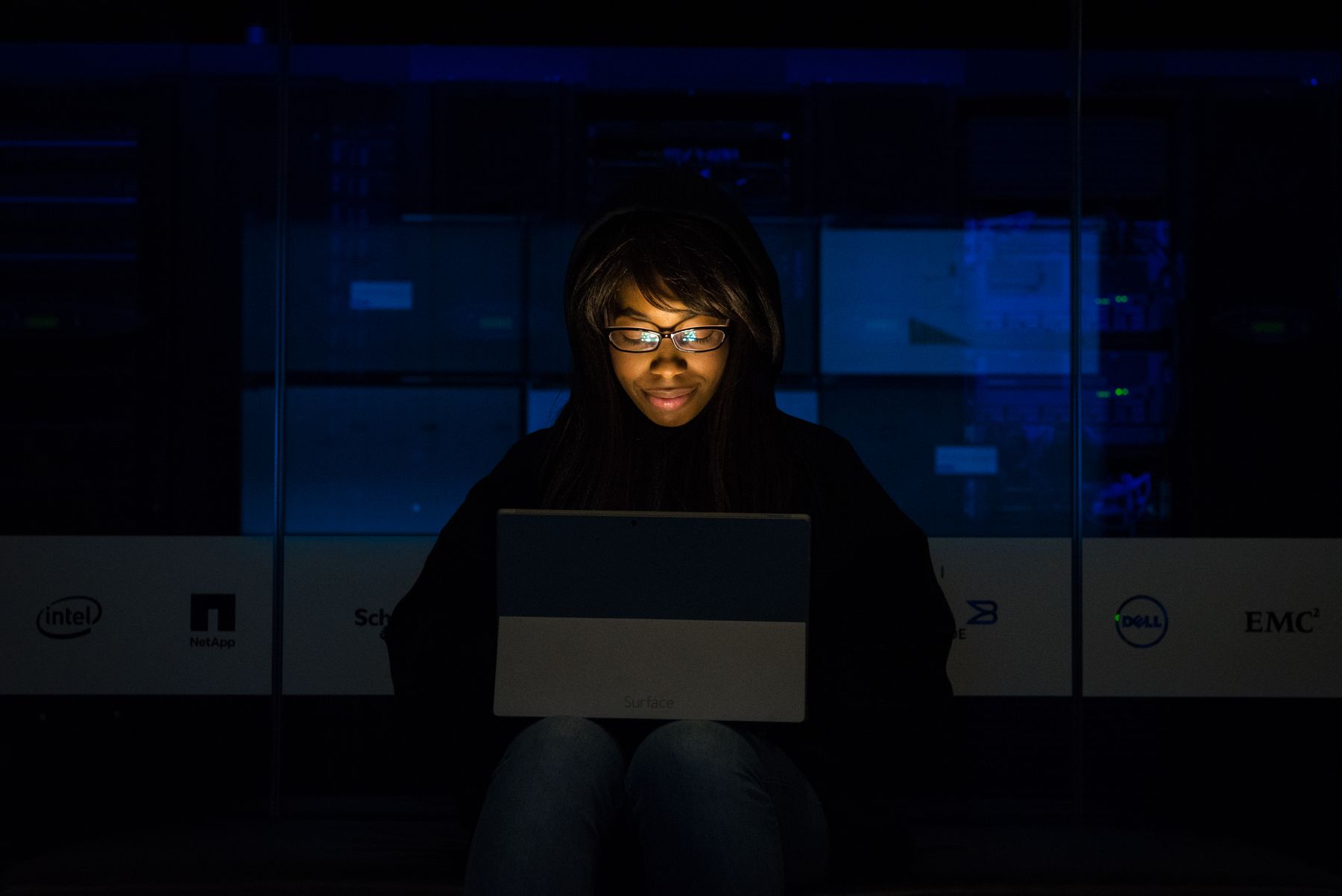 Engineer working with application infrastructure in a server room