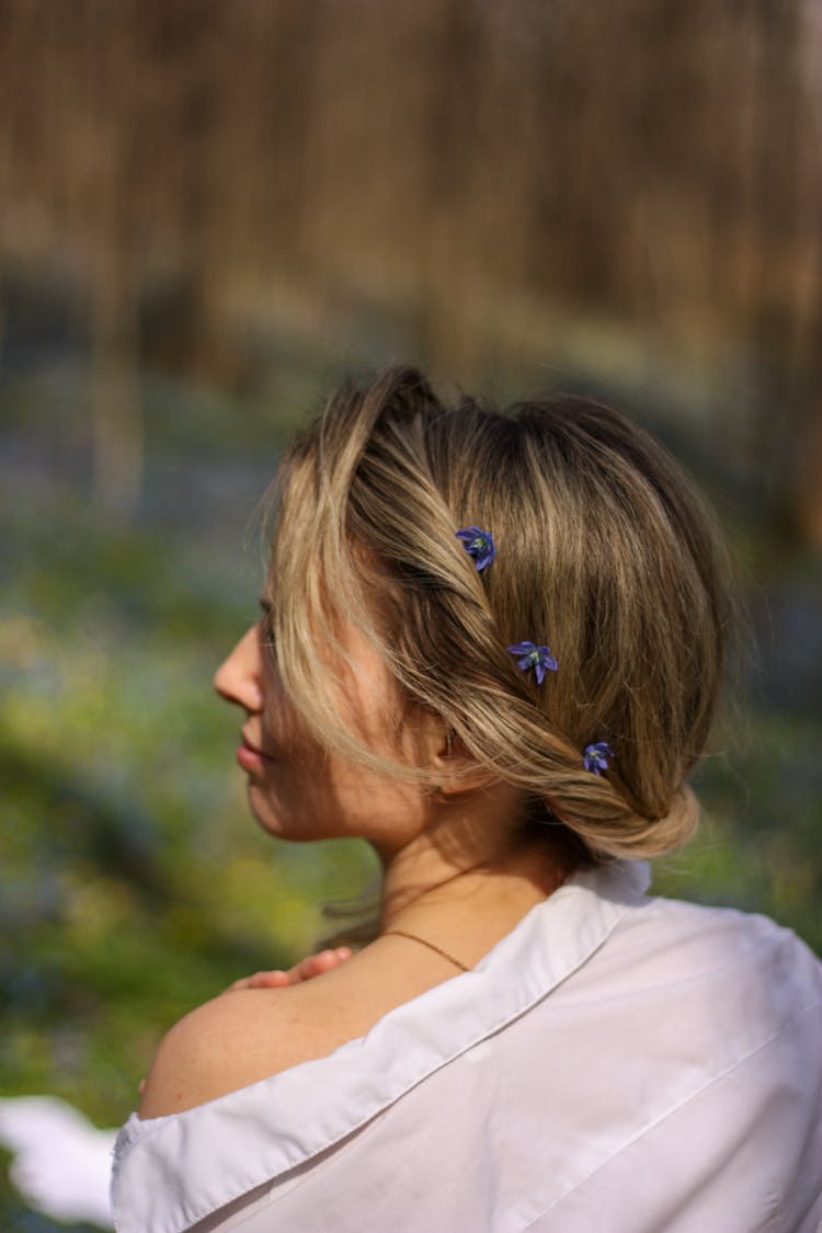 Woman With Hairstyle Posing In Forest