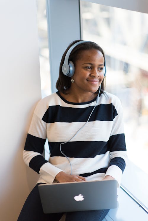 Free Photography of Woman Listening to Music Stock Photo