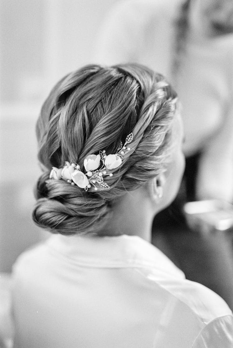 Black And White Photo Of Woman In Elegant Low Bun