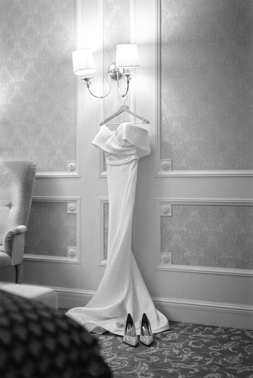 Free Dress Hanging on a Wall Lamp Stock Photo