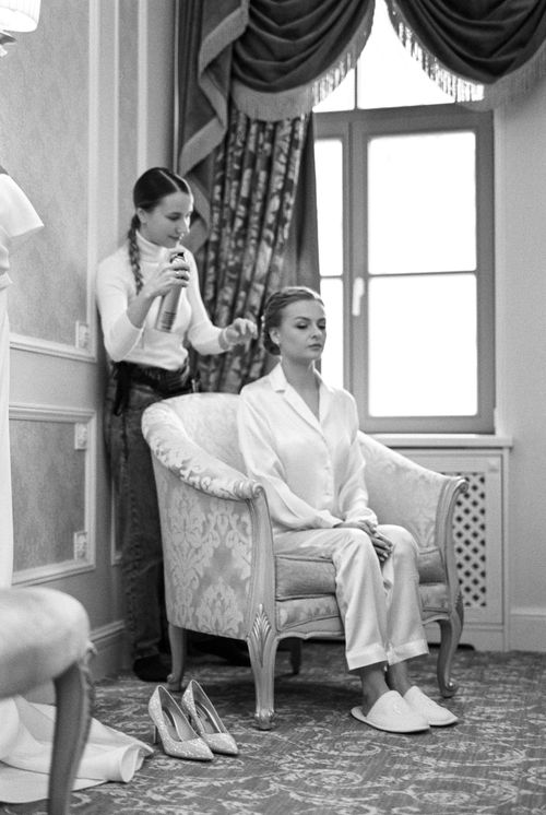Free Graceful bridal preparation captured in elegant black and white theme indoors. Stock Photo