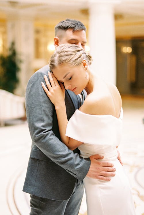 Bride and Groom Hugging 