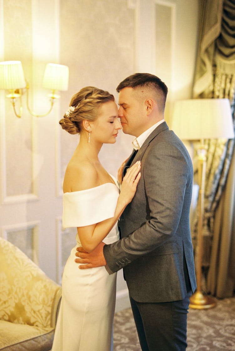 Tearful Embrace Of Bride And Groom