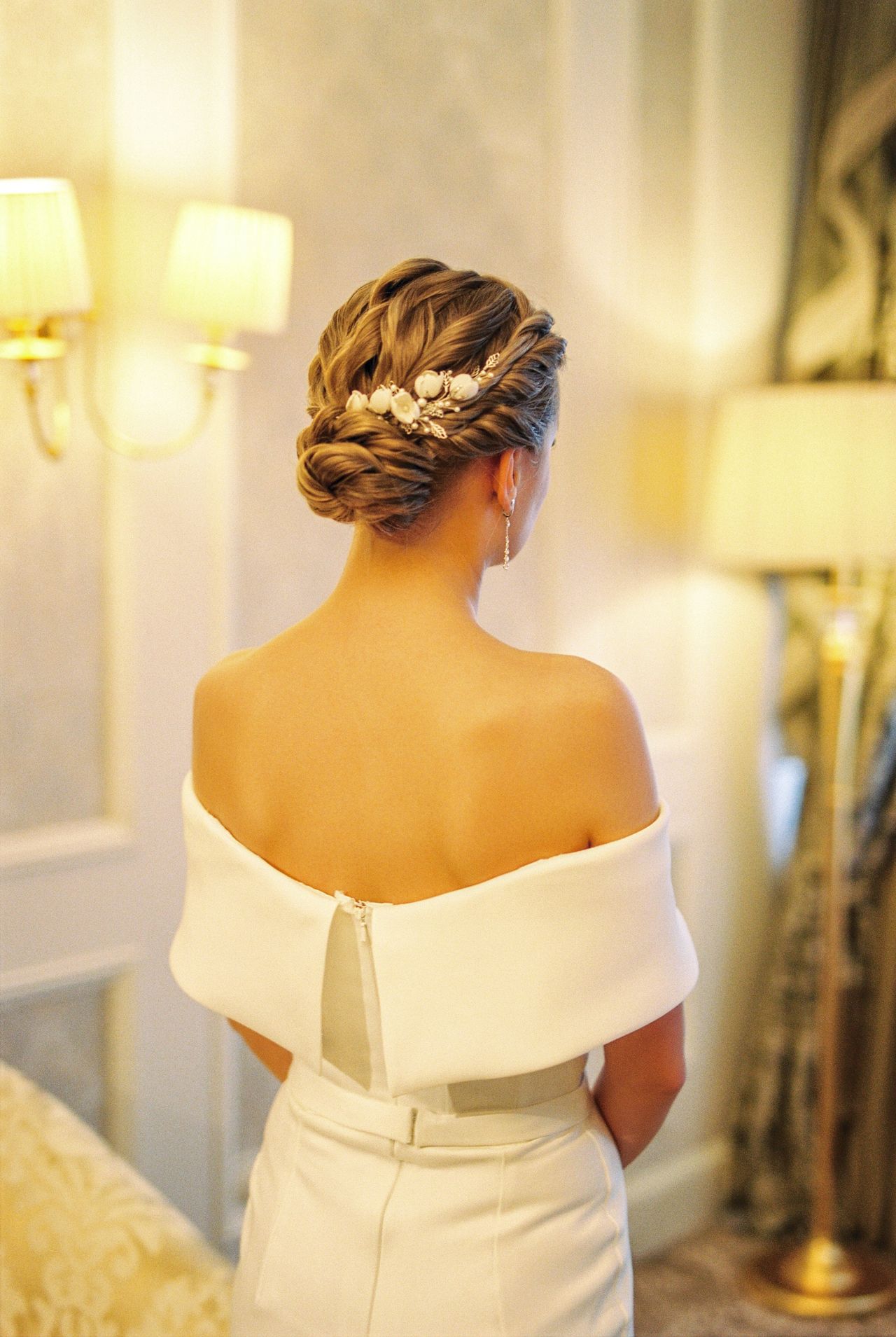 Elegant bridal updo hairstyle with gold hair accessories