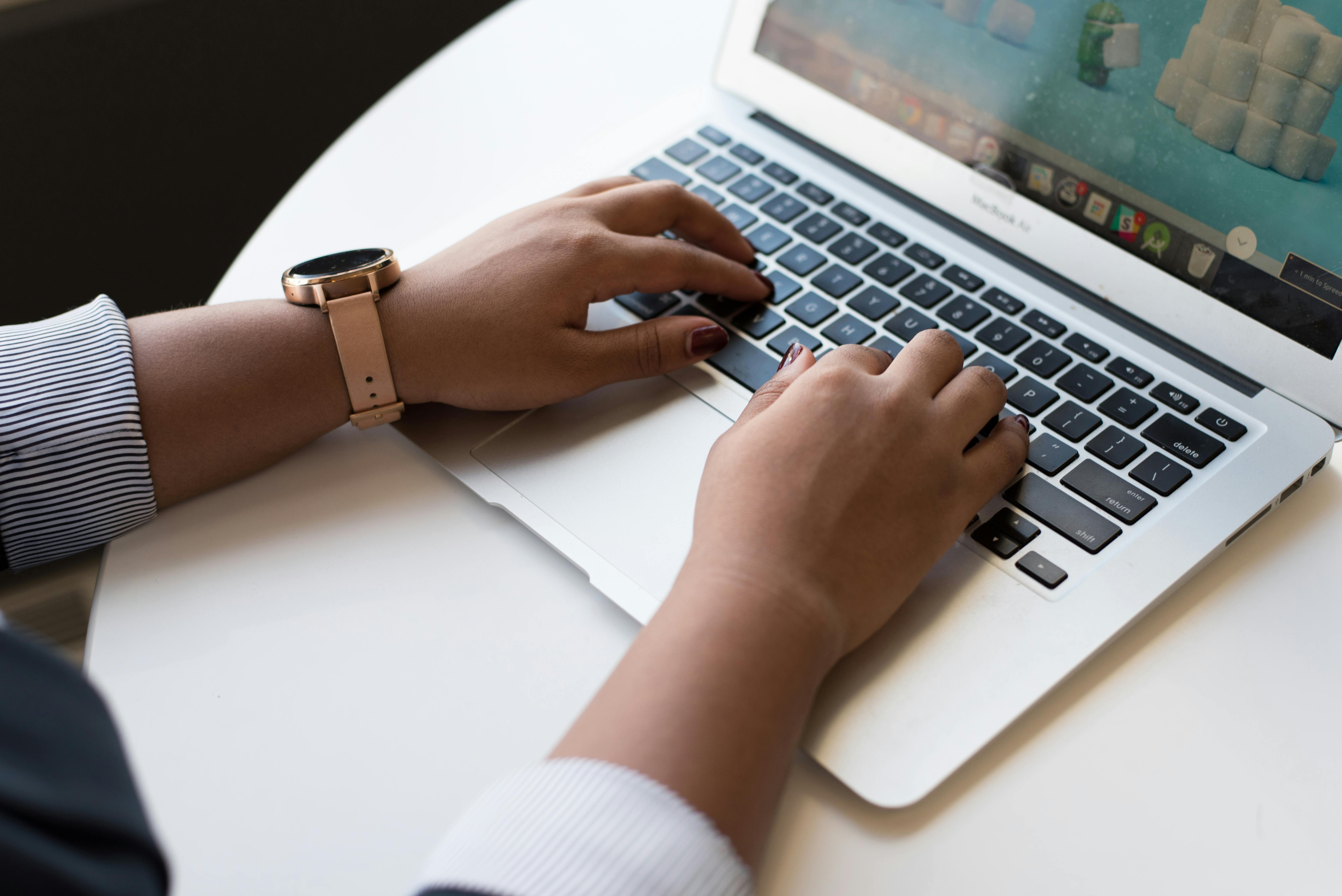 Person Using Macbook Air