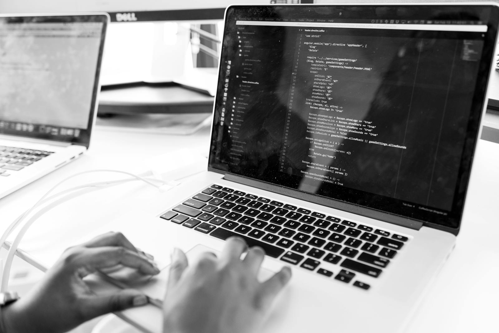 Developer and designer collaborating on website project