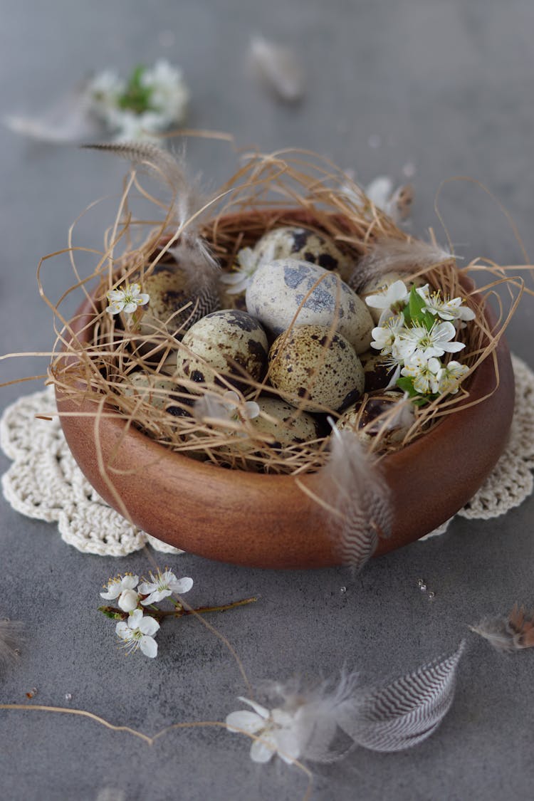 Easter Decoration Made With Quail Eggs And Feathers